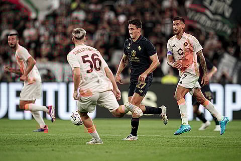 Serie A 2024-25 Juventus vs Roma: Juventus' Andrea Cambiaso, centre right, controls the ball